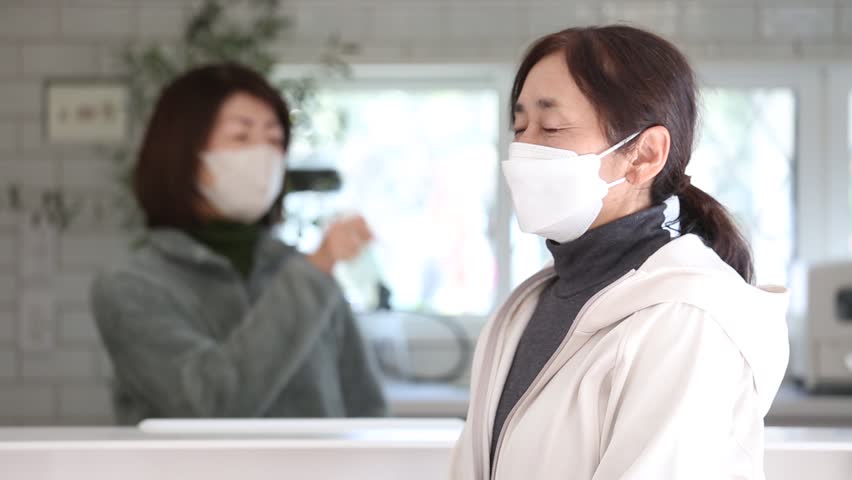 Japanese sisters suffering from hay fever Royalty-Free Stock Footage #1100020353