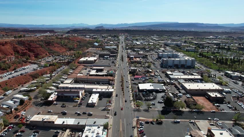 St. George, Utah USA. Aerial View of Traffic, Business Buildings and Red Stone Hills Royalty-Free Stock Footage #1100020921