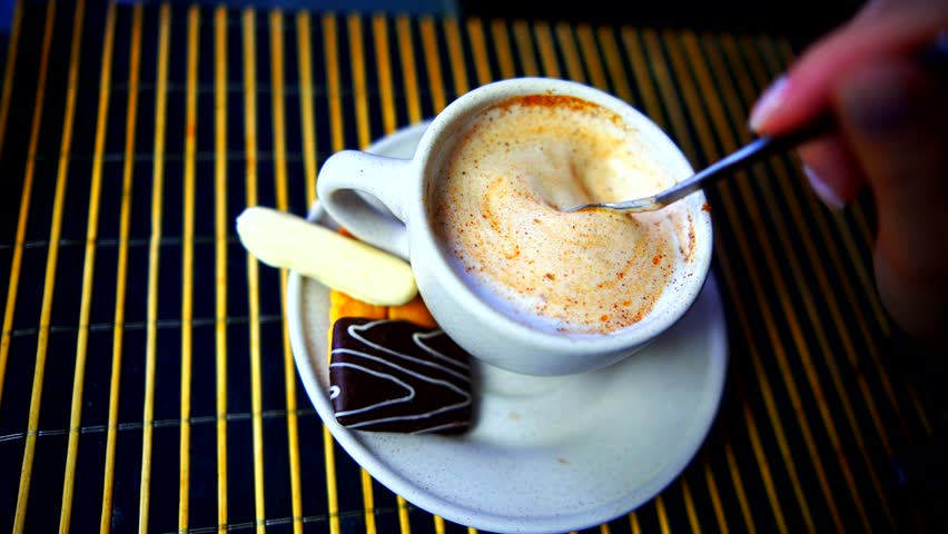 Cappuccino And Cinnamon Сardamom Coffee Shop.Coffee Macchiato On Breakfast .Milk Foam Cappuccino Latte Cafe Bar.Pours Cinnamon And Cardamom In Coffee Shop Cappuccino And Stirring Sugar Froth Milk Foam | Shutterstock HD Video #1100028809
