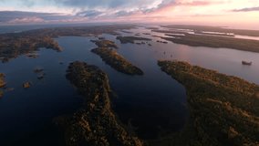 Amazing aerial sunset view with lots of islands. ProRes 422 LT 10 bit 4k