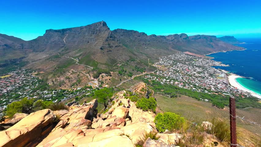 People hiking up to Lion