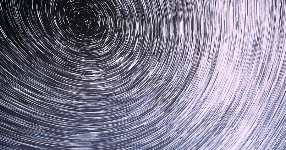4k Hyperlapse Trails Of Stars. Spin Of Unusual Amazing Stars Effect In Sky. Bewitching Illusion Of Star Trails. Star And Meteoric Trails On Night Sky Background. Rotate Of Sky Background. Large