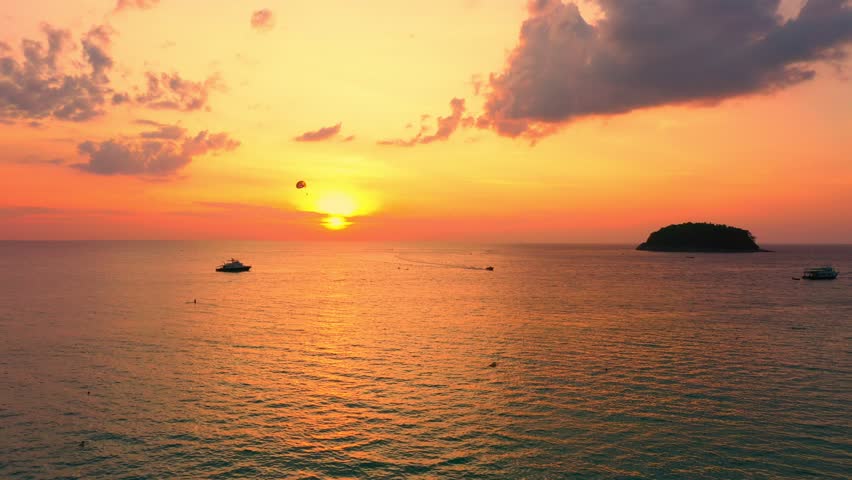Aerial view scenery sunset at Kata beach Phuket.
beautiful cloud at sunset in Kata beach Phuket Thailand.
4k stock footage video in travel concept. | Shutterstock HD Video #1100042811