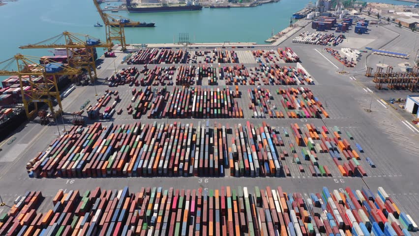 Thousands of commercial shipping containers on the port's ground waiting to be shipped 