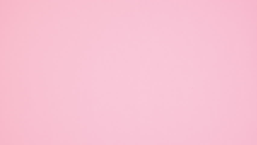6k School stationery background on copy space pastel pink background. Stop motion. Flat lay Royalty-Free Stock Footage #1100043995