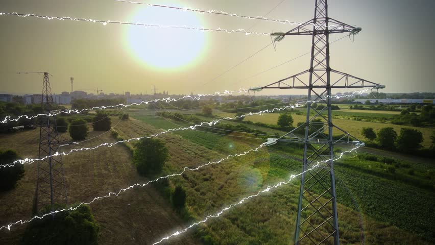 Aerial view of Power transmission lines and electricity poles with animation of lightening high voltage wires, drone close up pylon tower at sunset, green energy economical crisis concept | Shutterstock HD Video #1100046627