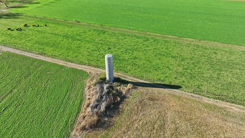 An Aerial View of An Amish Farm Water Tower and Countryside with a Point of Interest View on a Sunny Fall Day
