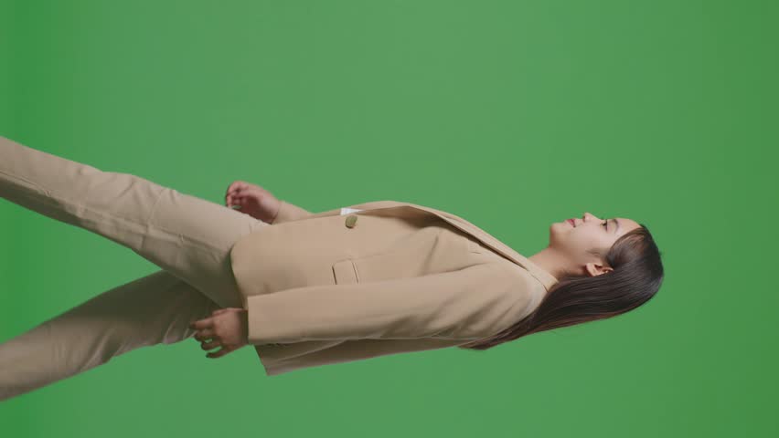 Side View Of Asian Business Woman Walking And Looking Around On Green Screen Chroma Key
 Royalty-Free Stock Footage #1100053315
