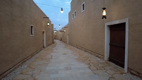 Camera moves ahead in the street of At-Turaif UNESCO World Heritage Site, Ad-Diriyah, Saudi Arabia
