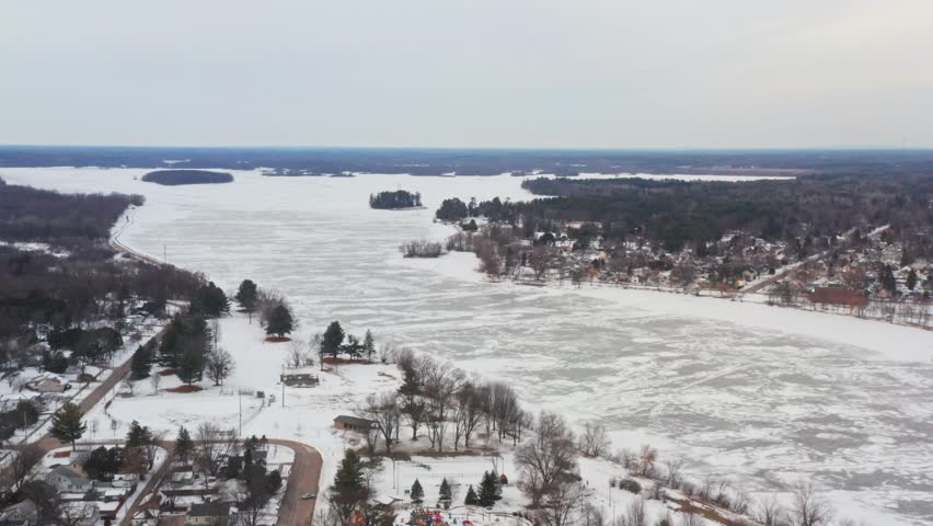 Aerial, frozen Wisconsin River during winter in Stevens Point