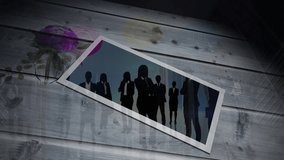 Animation of businesspeople silhouettes on photo over wooden surface. business, finance, connections, technology and digital interface digitally generated video. - Powered by Shutterstock - Get 15% off with code: PIKWIZARD15