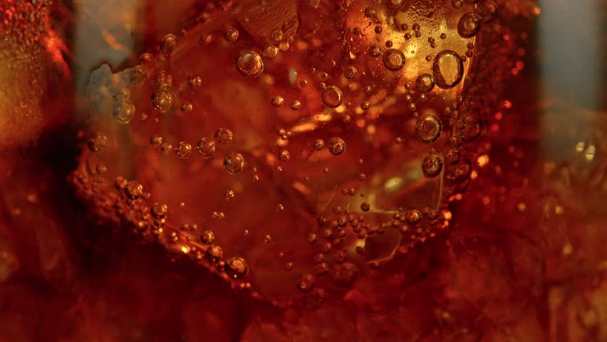Super slow motion of pouring cola into glass with speed motion. Filmed on high speed cinema camera, 1000 fps. Placed on high speed cine bot. Bar with bottles on background. Speed ramp effect. Royalty-Free Stock Footage #1100070931