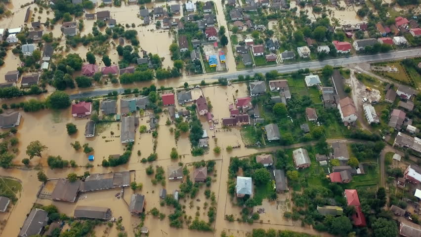 flood in city, aerial drone, flooded road. House with water, flooded by heavy rain, street after heavy rain, Disaster Insurance Claim, severe weather concept, impact of climate change, heavy rainfall Royalty-Free Stock Footage #1100076615