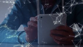 Animation of biracial male student using tablet over shapes. global business, connections and digital interface concept digitally generated video. - Powered by Shutterstock - Get 15% off with code: PIKWIZARD15