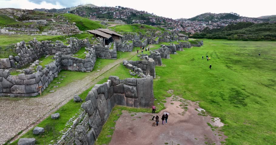Sacsayhuaman or Saqsaywaman is one of the Inca's ruins constructions as Machu Picchu. Cusco, Peru. Aerial above view drone high resolution 4k Royalty-Free Stock Footage #1100086057
