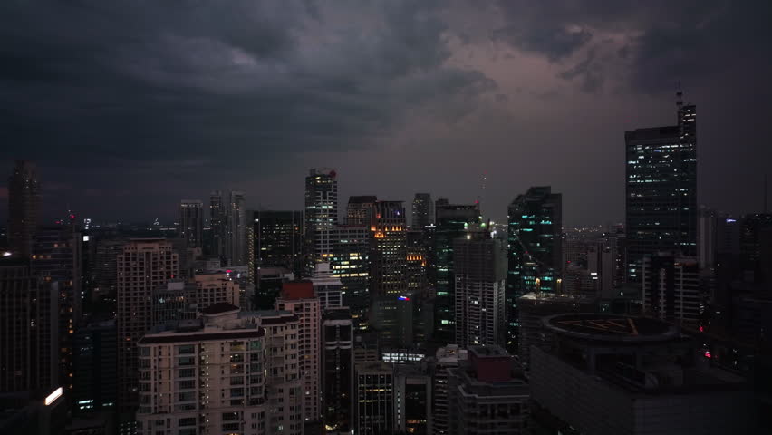 Flying Over The Evening Glowing Manila, Philippines