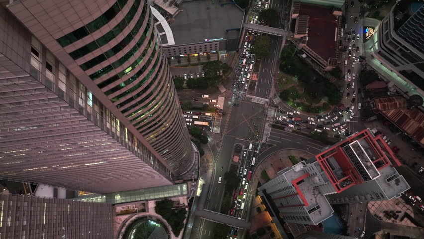 Flying Over The Evening Glowing Manila, Philippines