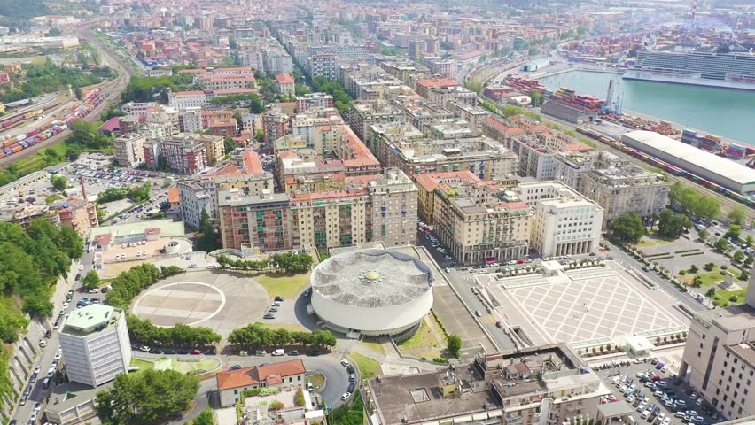 Inscription on video. La Spezia, Italy. Cathedral of Christ the King. City view. Multicolored text appears and disappears, Aerial View, Point of interest
