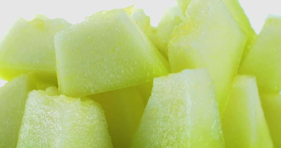 Yellow melon or cantaloupe melon with seeds isolated on white background, US Muskmelon on white background With clipping path.