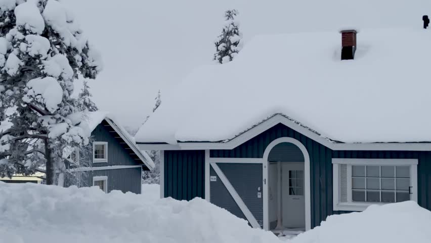 Shot of the small village Saariselka in Finland in winter. Sami village. Urho Kekkonen National Park. Kaunispää Triangulation Tower. Ski resorts. Walk in Saariselka. Frozen trees in Finland. Sunset.