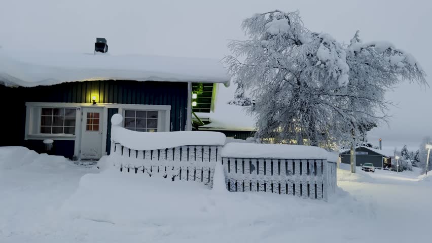 Shot of the small village Saariselka in Finland in winter. Sami village. Urho Kekkonen National Park. Kaunispää Triangulation Tower. Ski resorts. Walk in Saariselka. Frozen trees in Finland. Sunset.