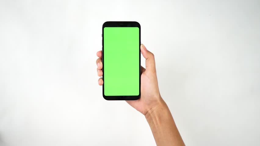 Hands holding and show up smartphone with green screen | Shutterstock HD Video #1100130849