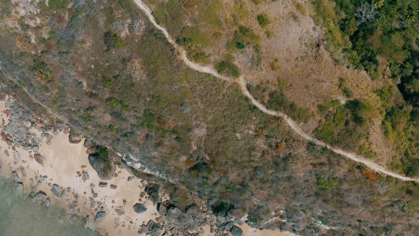 Mayotte - Flying above a path along the sea