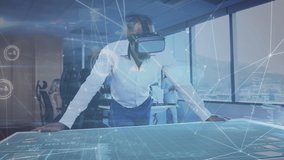Animation of network of connections against african american businessman wearing vr headset. Global networking and business technology concept - Powered by Shutterstock - Get 15% off with code: PIKWIZARD15