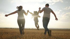 happy family. father mother and daughter together run throw up in park at sunset silhouette. people in park. happy family and little baby child summer. kid dream concept. children run fun - Powered by Shutterstock - Get 15% off with code: PIKWIZARD15