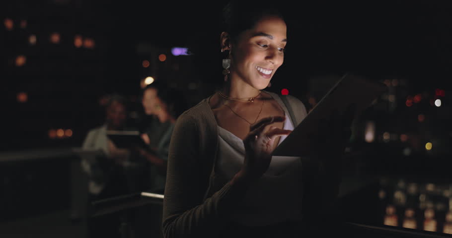 Woman, digital tablet and rooftop at night in city for social media, research and networking on urban background. Businesswoman, balcony and online search by entrepreneur working late in New York | Shutterstock HD Video #1100155673