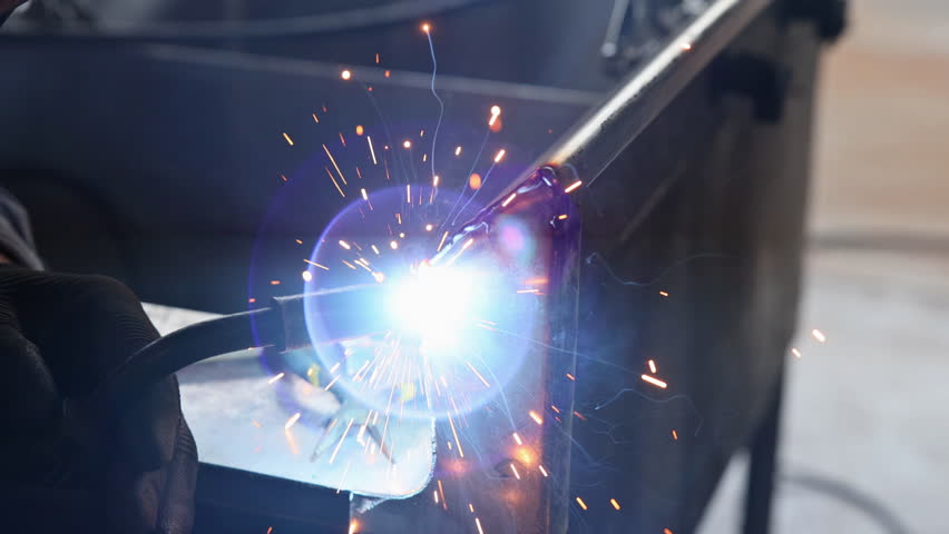 Using semiautomatic argon gas shielded welding semi-automatic machine worker works welding metal Royalty-Free Stock Footage #1100157769