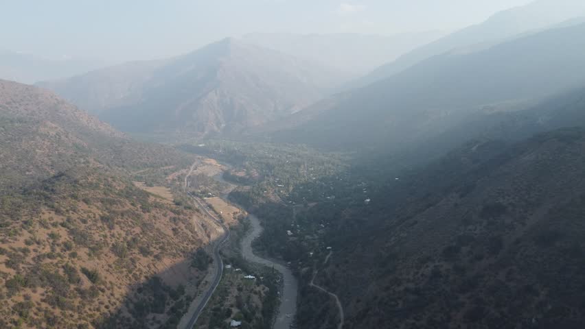 Drone footage. Panoramic view over mountain side. Maipo River. Chile