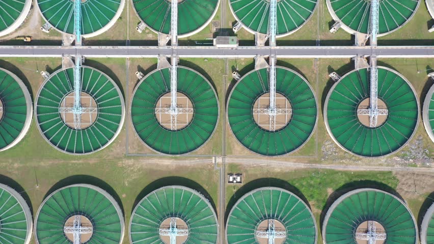 Drinking Water Treatment Technology and Distribution Plant. Aerial view of metropolitan waterworks authority. Water recycling industry. Royalty-Free Stock Footage #1100165953