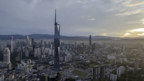Aerial view hyperlapse 4k video of Kuala Lumpur city center view during dawn overlooking the city skyline in Federal Territory, Malaysia. 