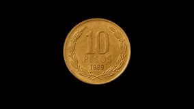 Reverse of Chile coin 10 pesos 1989, isolated in black background. 4k video