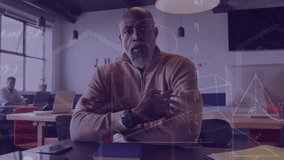 Animation of mathematical equations and symbols over african american businessman working at office. Global business, finances and digital interface concept digitally generated video.