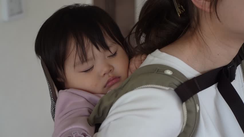 mother putting her child to sleep
 Royalty-Free Stock Footage #1100191317
