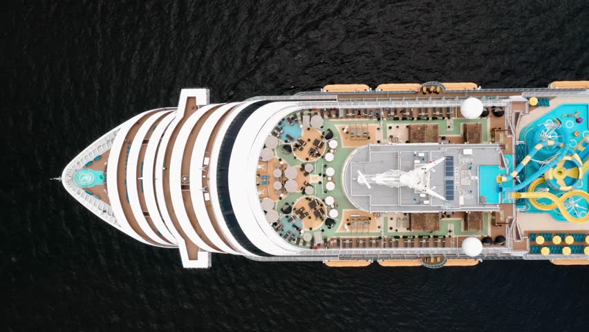 aerial view of cruise ship advancing on sea