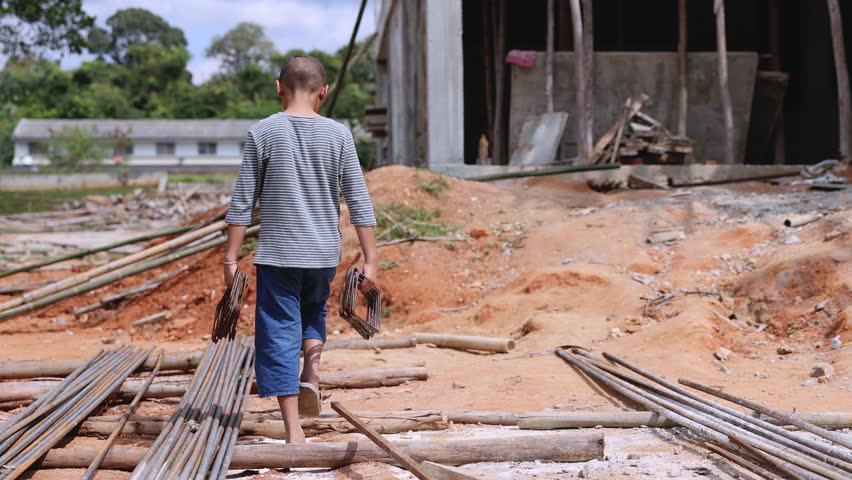 Children are forced to work in construction. anti child labor Abuse, oppression or coercion, forced child labor Human trafficking. 4K slow motion. | Shutterstock HD Video #1100208967