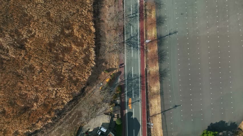 Aerial view of modern road and parking lot.