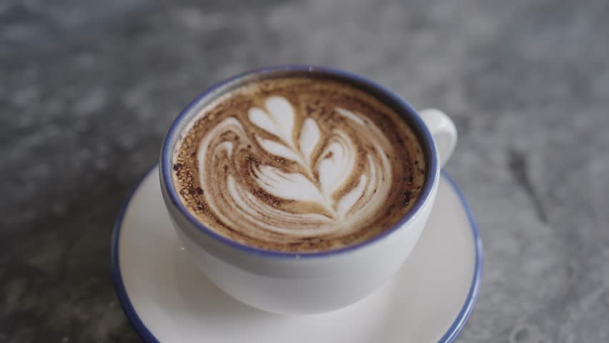 Close Up Cup of Coffee on The Table | Shutterstock HD Video #1100212569