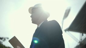 Real estate project manager or architect looking using tablet for checking and consultant to inspection in construction site building. Middle eastern Boss CEO, business owner Real estate property - Powered by Shutterstock - Get 15% off with code: PIKWIZARD15