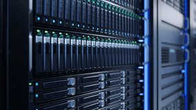 Close-up of Server Racks with HDD and SSD with Blinking Lights in Modern Datacenter. Advanced Cloud Computing and Machine Learning Concept. - Powered by Shutterstock - Get 15% off with code: PIKWIZARD15