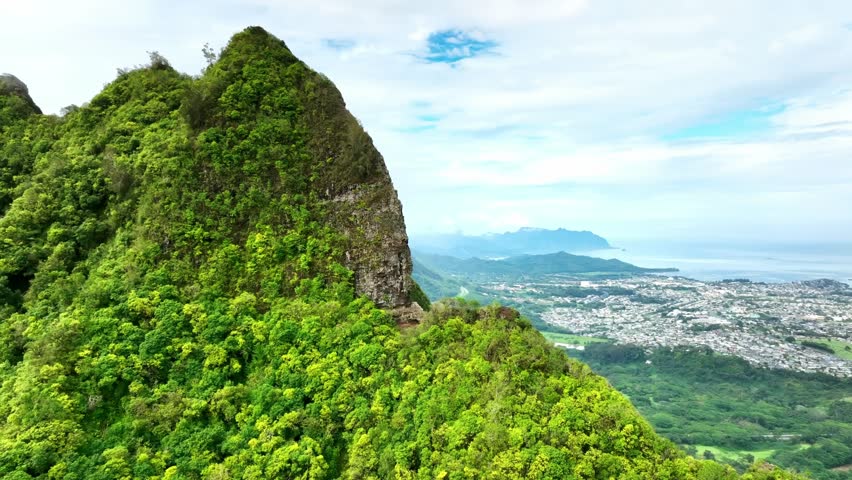 Aerial view Pali Lookout, mountain cliff on Oahu windward side. Drone Hawaii. tourism destination landmark, vacation nature sightseeing travel. 