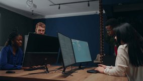 software testers team working in office, african and caucasian people, diverse and multiethnic team - Powered by Shutterstock - Get 15% off with code: PIKWIZARD15