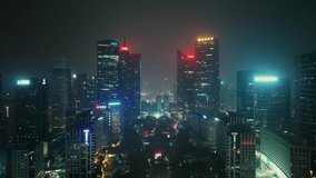 Guangzhou city urban aerial view drone footage at night in China