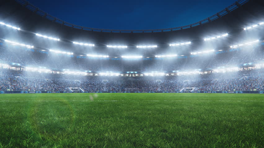 Aesthetic Static Establishing Shot of Big and Empty Soccer Football Stadium With Crowd Of Fans Cheering in Excitement Before the Match. Lights Are Shining on The Sports Arena Grass Field. | Shutterstock HD Video #1100228993