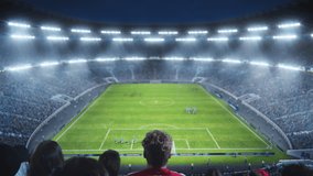High Angle Establishing Shot of Fans Cheer for the Team on a Big Stadium During Soccer Championship Match. Teams Play, Crowd of Fans Celebrate Victory. Football Tournament. Cinematic Static Wide Shot - Powered by Shutterstock - Get 15% off with code: PIKWIZARD15