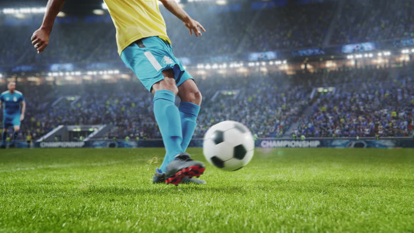 Aesthetic Shot Of Athletic Hispanic Footballer Shooting A Penalty Kick On Stadium With Crowd Cheering. International Soccer Championship Final Match With Fans On Tribune. Super Slow Motion. | Shutterstock HD Video #1100229021