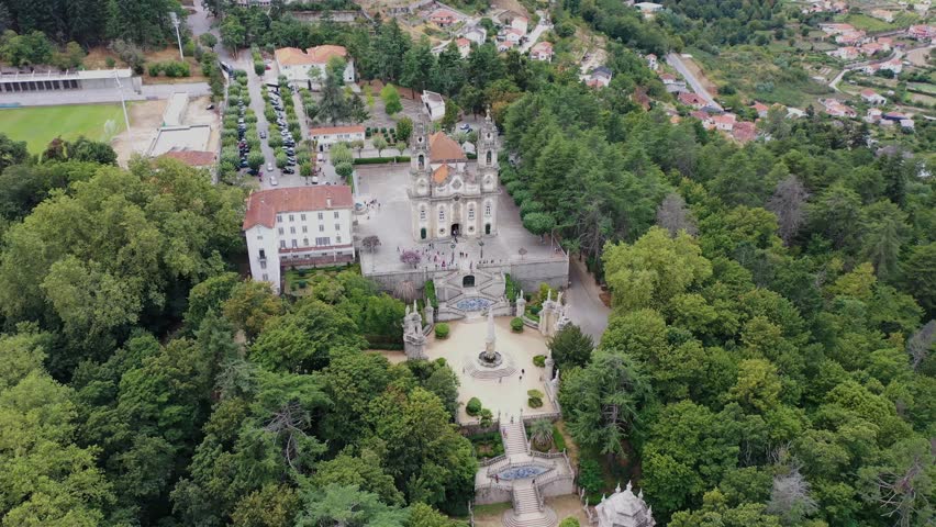 Aerial view of Bom Jesus do Monte, a Catholic Church on the hilltop with famous stairs in Braga, Portugal. | Shutterstock HD Video #1100230617
